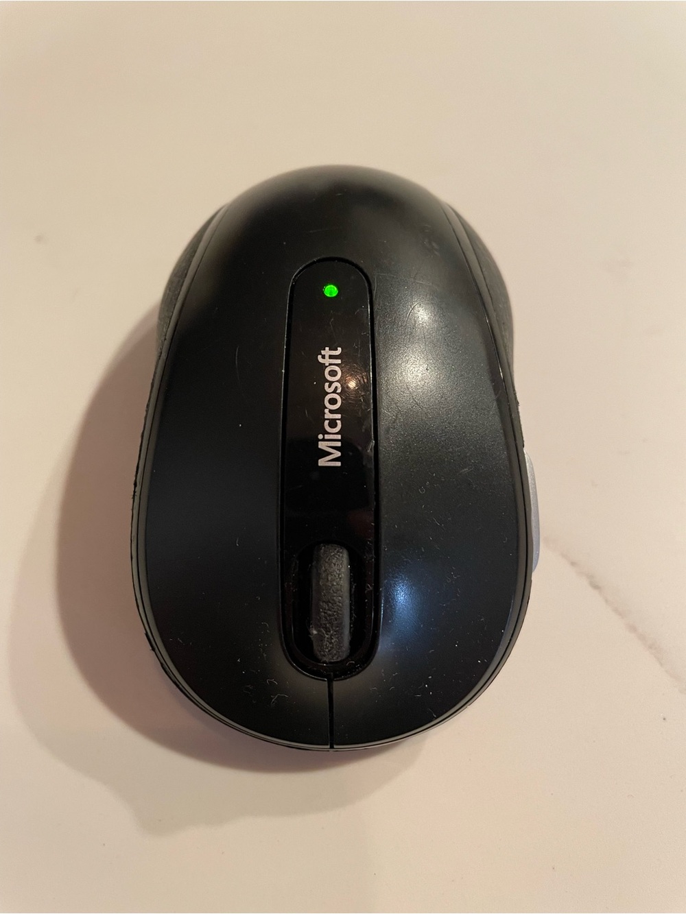 Microsoft Black Wireless Mouse with Green Indicator Light